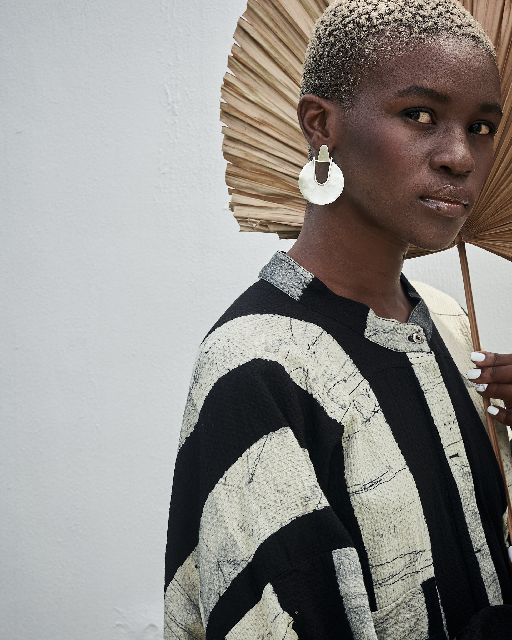 Editorial_shot_of_Thoko_wearing_Elektra_Earrings_Brass_Medium