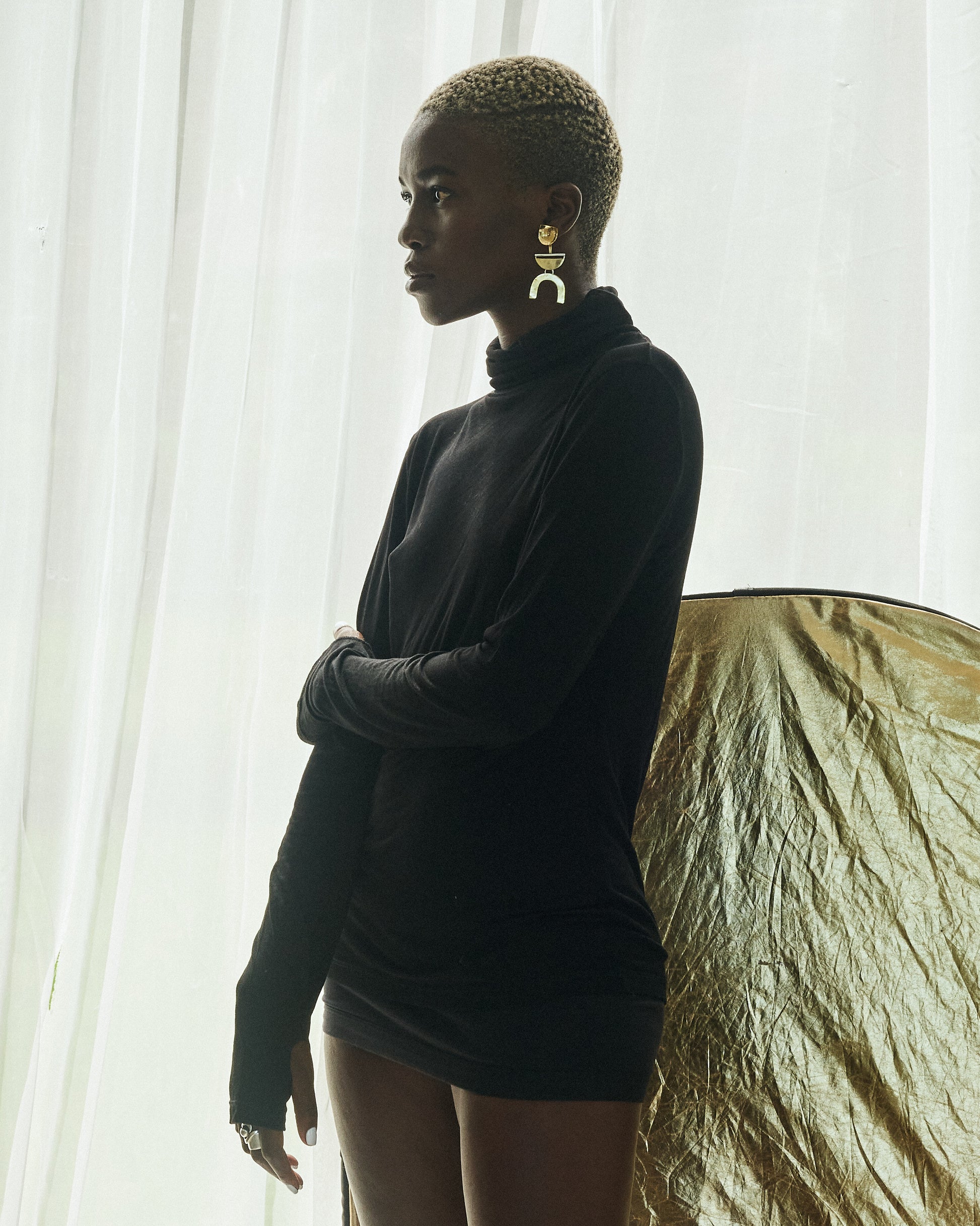 Editorial_Shot_of_Thoko_wearing_The_Dancers_Earrings_Brass