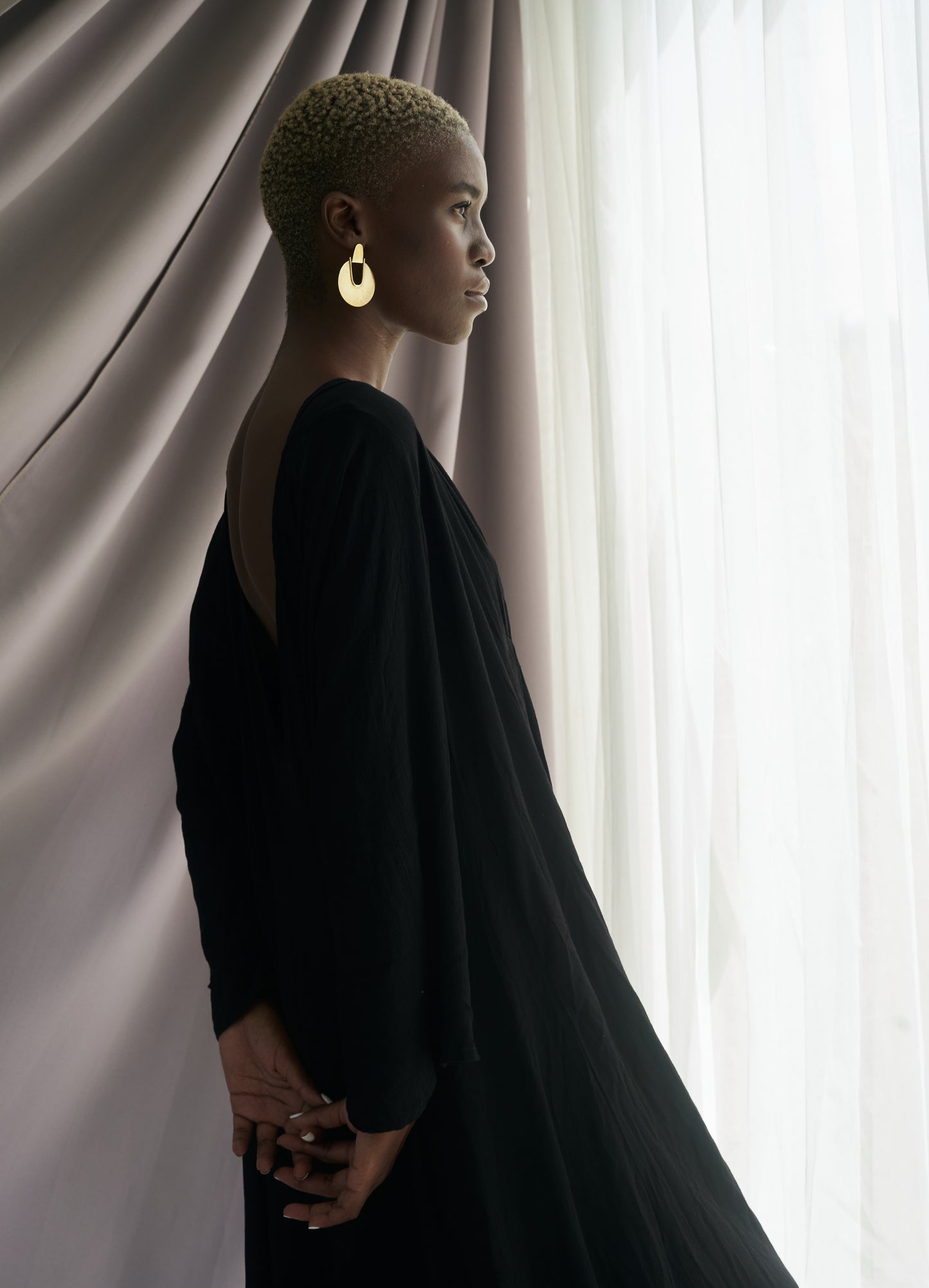 Editorial_shot_of_Thoko_wearing_Elektra_Earrings_Brass_Medium
