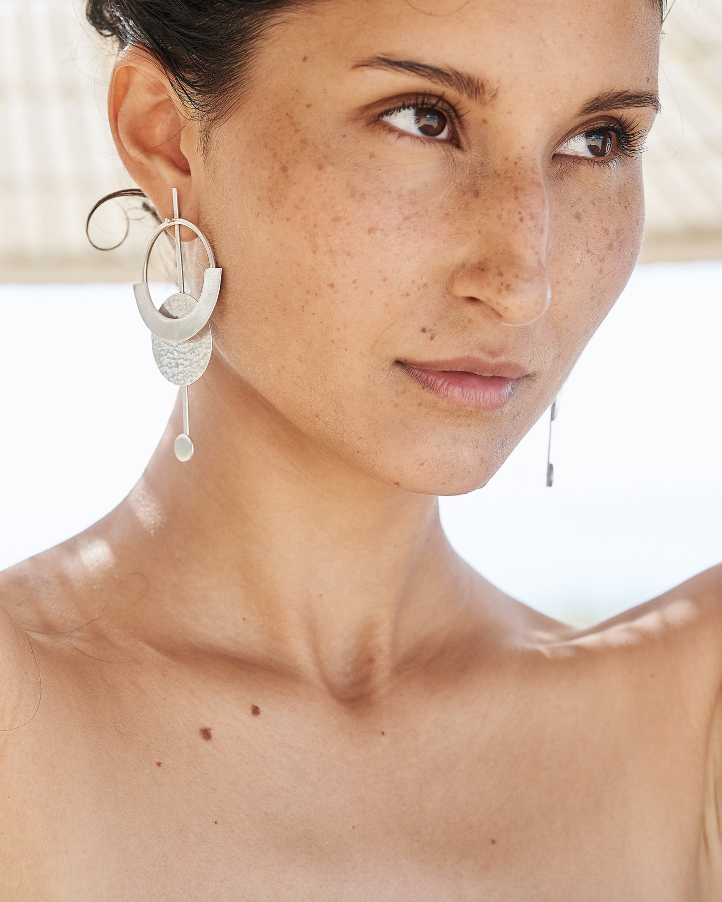 Beauty_shot_of_Alvina_wearing_Constellation_Earrings_Silver_Large