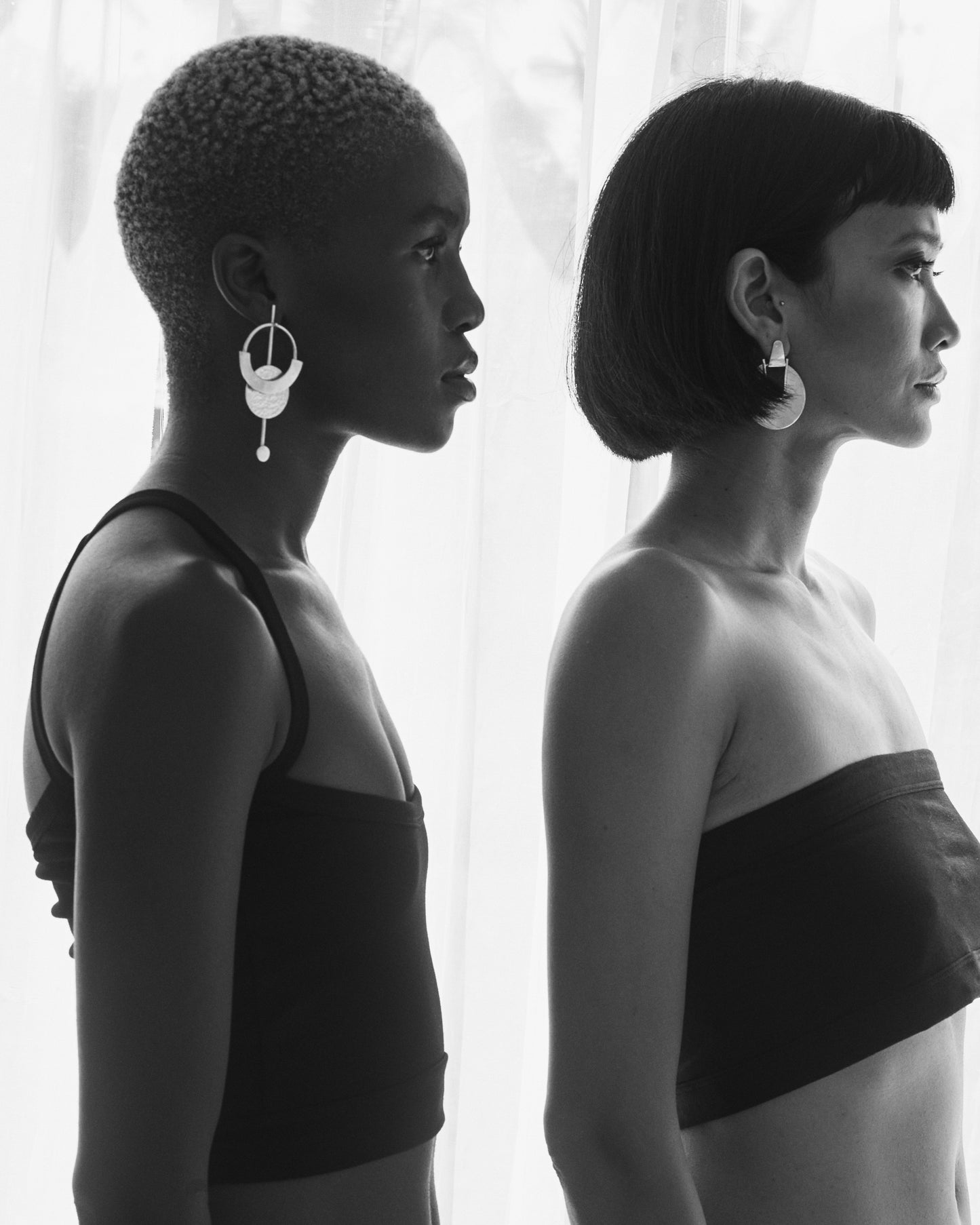 Editorial_shot_of_Thoko_and_Sasri_wearing_Constellation_Earrings_Silver_Large_and_Elektra_earring